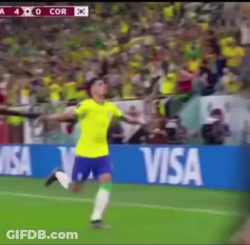 A Soccer Player Is Running On A Field In Front Of A Visa Ad GIF