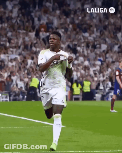 A Soccer Player Is Running On A Field With A Laliga Logo In The Background GIF