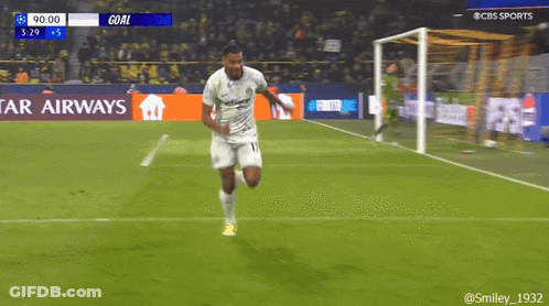 A Soccer Player Is Running On A Field With A Star Airways Banner In The Background GIF