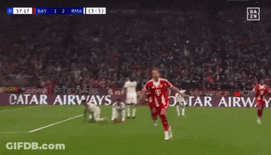 A Soccer Player Is Running On The Field With A Qatar Airways Ad In The Background GIF