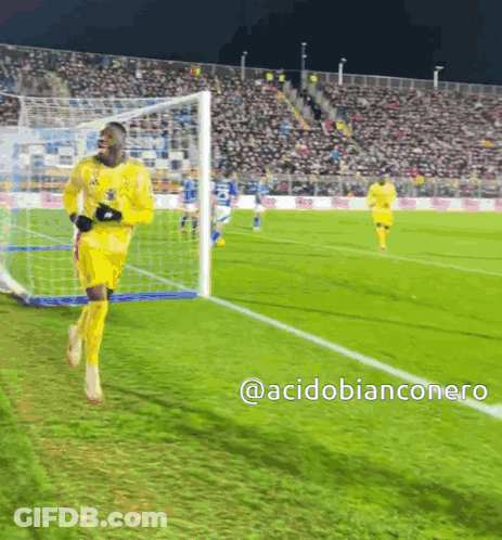 A Soccer Player Is Running Towards The Goal With The Hashtag Acidobianconero On The Bottom GIF