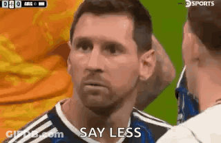 A Soccer Player Is Saying `` Say Less '' To Another Player During A Game . GIF