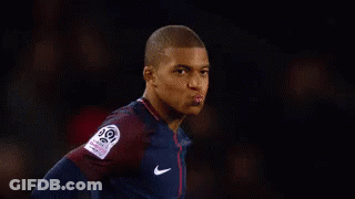A Soccer Player Is Standing In Front Of A Sign That Says I Know . GIF