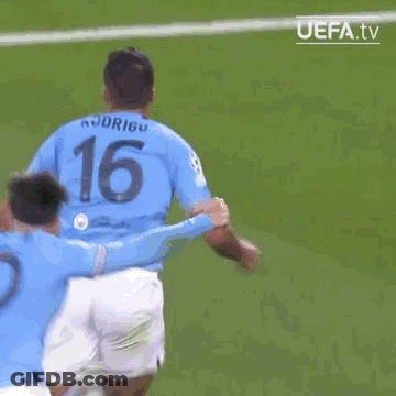 A Soccer Player Is Standing In The Corner Of A Soccer Field With His Arms Outstretched . GIF