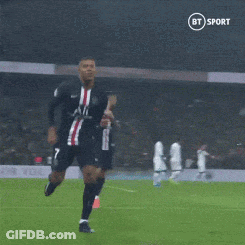 A Soccer Player Is Taking A Picture Of Himself On The Field GIF