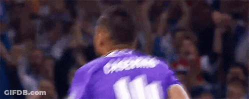 A Soccer Player Is Wearing A Purple Jersey With The Number 11 On It . GIF