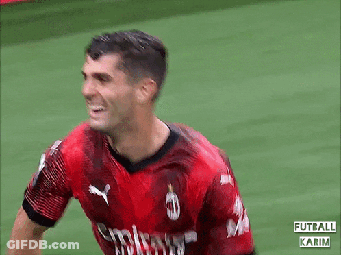 A Soccer Player Is Wearing A Red Emirates Shirt GIF