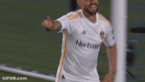 A Soccer Player Is Wearing A Shirt That Says Herbalife On It GIF
