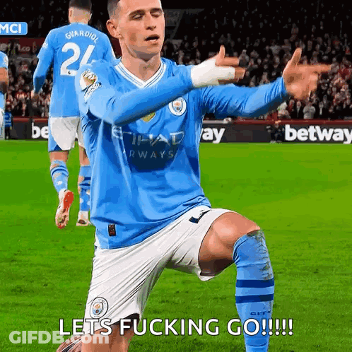 A Soccer Player Kneeling On The Field With The Words Let 'S Fucking Go GIF