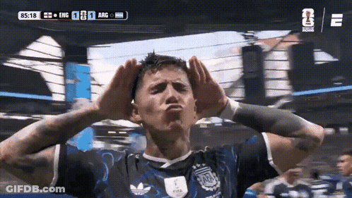 A Soccer Player Making A Face With His Hands On His Head During A Match Between England And Argentina GIF