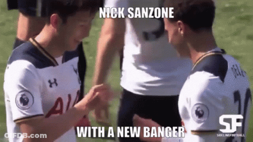 A Soccer Player Named Nick Sanzone Is Shaking Hands With Another Player GIF