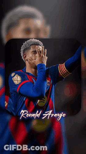 A Soccer Player Named Ronald Araujo Is Wearing A Blue And Red Jersey GIF