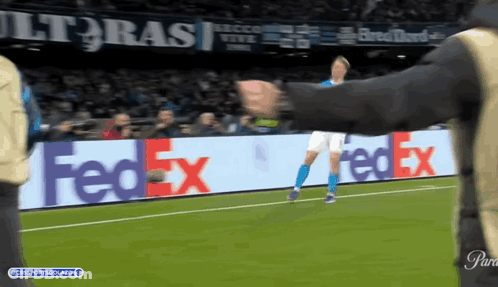 A Soccer Player On A Field With A Fedex Sign In The Background GIF