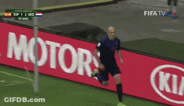 A Soccer Player On A Field With Kia Motors Advertisements GIF