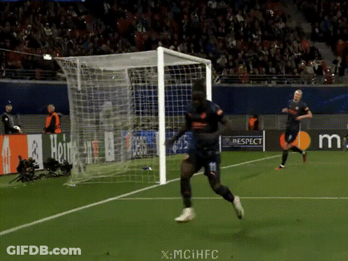 A Soccer Player Runs Towards A Goal With A Watermark That Says X-Mciihfc GIF