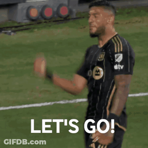A Soccer Player Says Let 'S Go As He Holds His Fist In The Air GIF