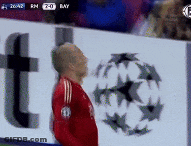 A Soccer Player Stands In Front Of A Banner That Says Bay GIF