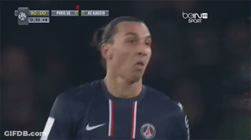 A Soccer Player Stands In Front Of A Bein Sports Screen GIF