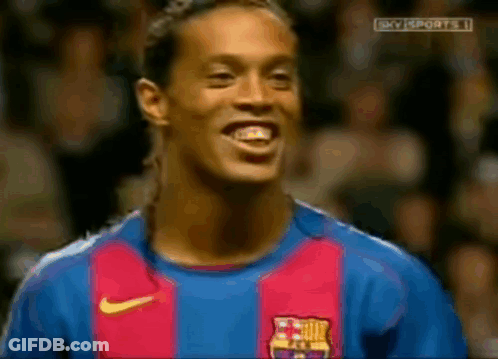 A Soccer Player Wearing A Barcelona Jersey Is Smiling GIF