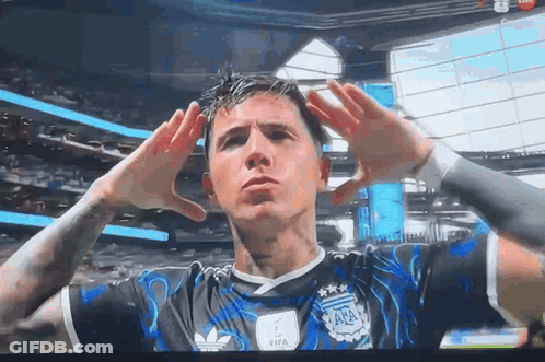 A Soccer Player Wearing A Black And Blue Adidas Jersey GIF
