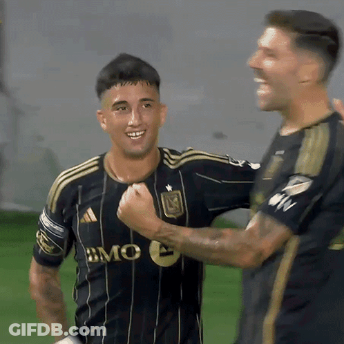 A Soccer Player Wearing A Black And Gold Jersey With Bmc On It GIF