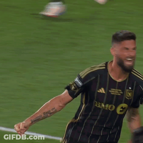 A Soccer Player Wearing A Black And Gold Jersey With The Word Bmo On It GIF