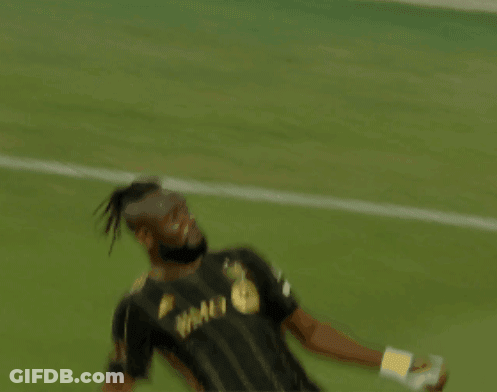 A Soccer Player Wearing A Black And Gold Shirt That Says Bmo On It GIF
