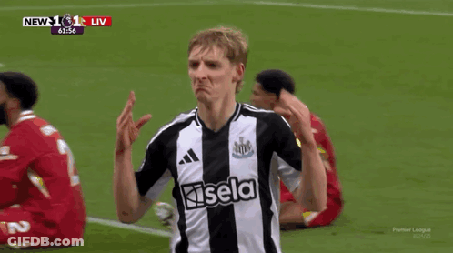 A Soccer Player Wearing A Black And White Jersey That Says Igol GIF
