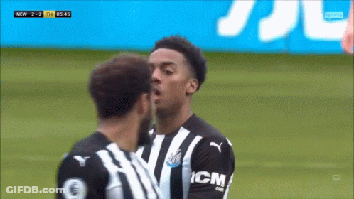 A Soccer Player Wearing A Black And White Jersey With Icm On The Front GIF