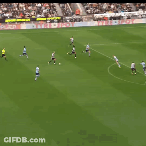 A Soccer Player Wearing A Black And White Striped Jersey With The Word United On The Front GIF