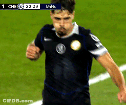 A Soccer Player Wearing A Black Jersey With A Volkswagen Logo On It GIF
