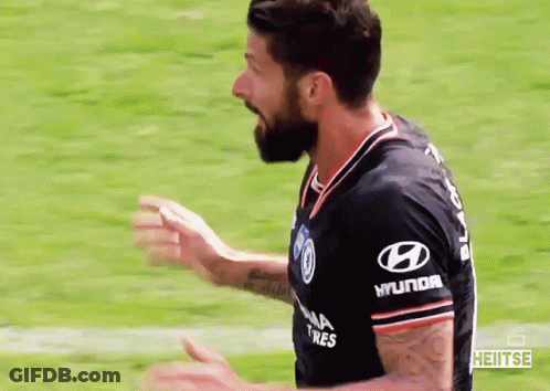 A Soccer Player Wearing A Black Shirt With Hyundai Tires On The Sleeves GIF