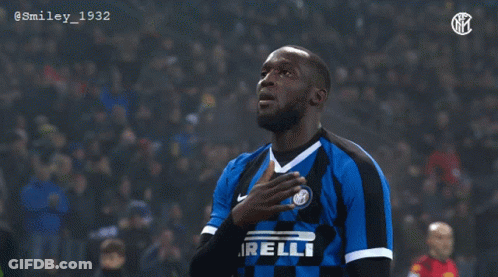 A Soccer Player Wearing A Blue And Black Jersey With The Word Irelli On The Front GIF