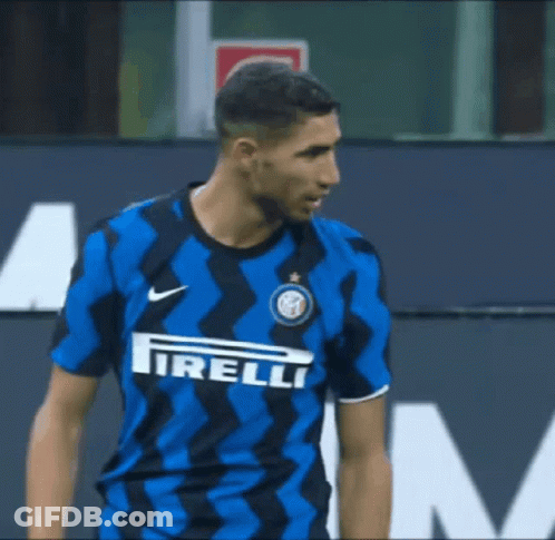 A Soccer Player Wearing A Blue And Black Shirt With The Word Irelli On The Front GIF