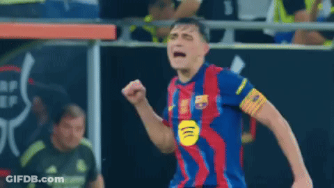 A Soccer Player Wearing A Blue And Red Jersey With The Letter B On It GIF