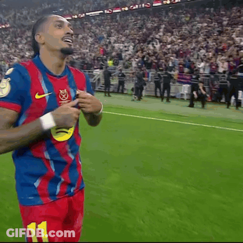 A Soccer Player Wearing A Blue And Red Jersey With The Word Ambr On It GIF