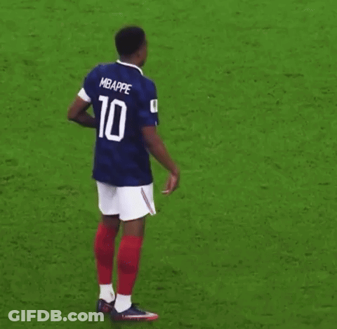 A Soccer Player Wearing A Blue And White Jersey With The Number 10 On It Is Standing On A Soccer Field . GIF
