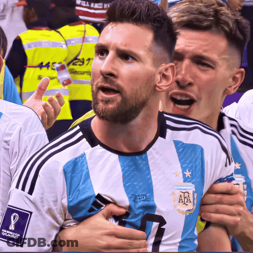 A Soccer Player Wearing A Blue And White Jersey With The Number 7 On It GIF