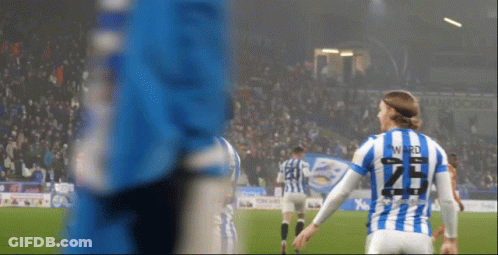 A Soccer Player Wearing A Blue And White Striped Jersey With The Number 25 On The Back GIF