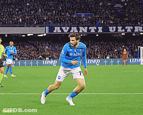 A Soccer Player Wearing A Blue And White Uniform With The Number 7 On It GIF