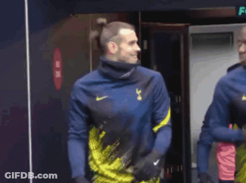 A Soccer Player Wearing A Blue And Yellow Nike Shirt GIF