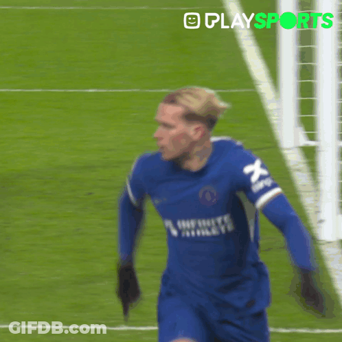 A Soccer Player Wearing A Blue Jersey That Says ' X ' On It GIF