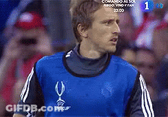 A Soccer Player Wearing A Blue Jersey With A U On It GIF