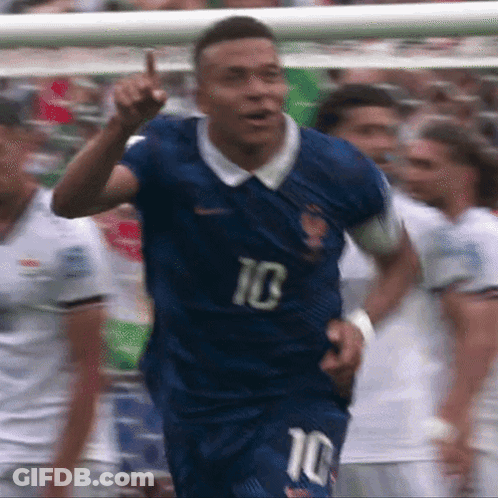 A Soccer Player Wearing A Blue Jersey With The Number 10 GIF