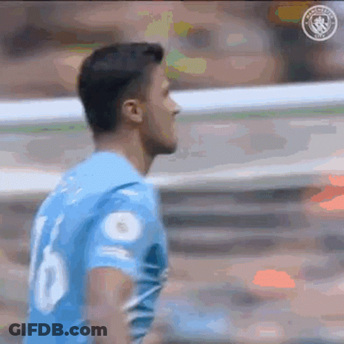 A Soccer Player Wearing A Blue Jersey With The Number 10 On It Is Standing On A Field . GIF