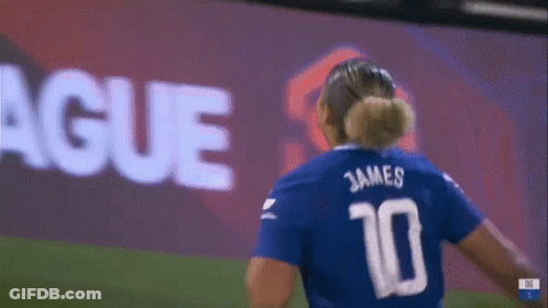 A Soccer Player Wearing A Blue Jersey With The Number 10 On The Back GIF