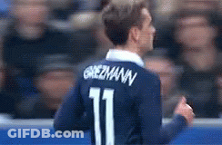 A Soccer Player Wearing A Blue Jersey With The Number 11 On It GIF