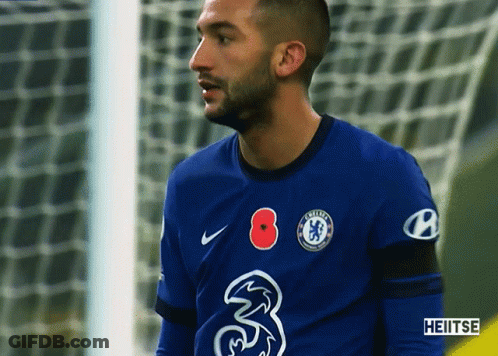 A Soccer Player Wearing A Blue Jersey With The Number 3 On It GIF