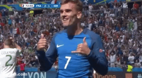 A Soccer Player Wearing A Blue Jersey With The Number 7 On It GIF