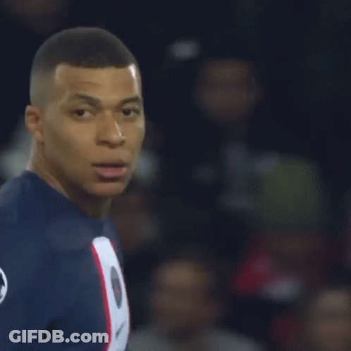 A Soccer Player Wearing A Blue Jersey With The Number 7 On The Back GIF